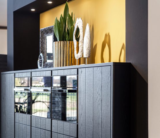 Detail of home interior, part of kitchen interior with ovens, modern style.